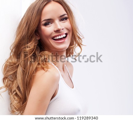 Portrait of beautiful smiling blonde woman