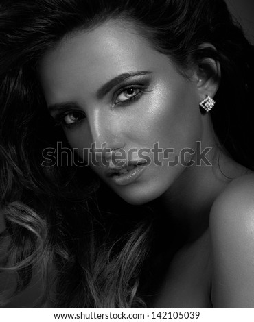 Black and white photo of beautiful woman portrait with healthy, clear and fresh skin. Hundred percent of the original texture of the skin