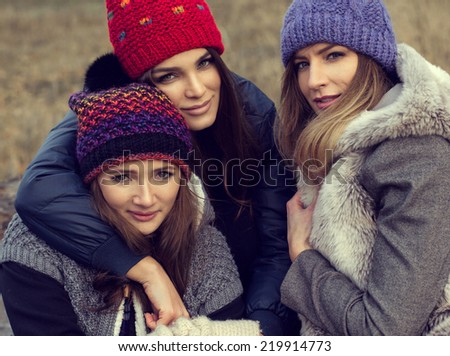 Portrait of happy women in woolly hats
