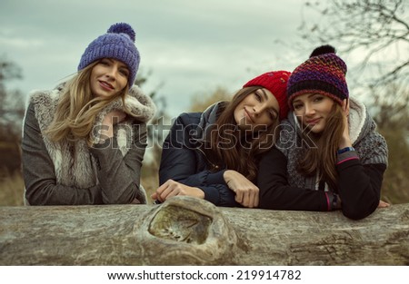 Portrait of happy women in woolly hats