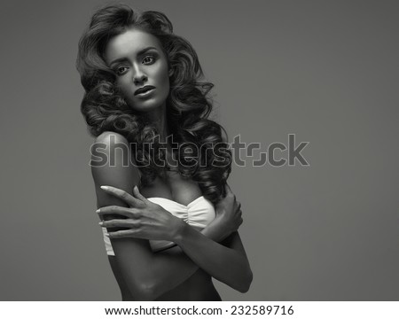 Black and white fashion portrait of sensual young model