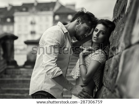 Black and white photo of attractive couple