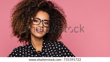 Beautiful black woman model wear glasses and black shirt in peas