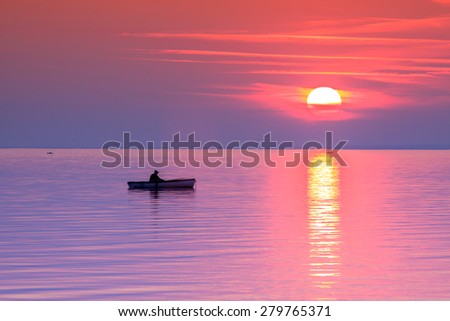 A beautiful Sunset seen the fishing boat in Balaton lake-Hungary.Minimal  color style