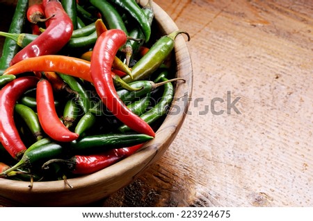 red chillies on a wooden board