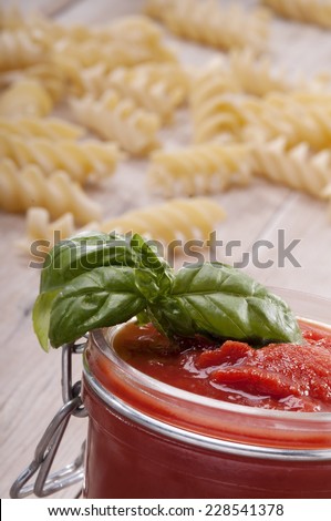 Composition of ingredients for the preparation of tomato sauce in the Italian manner