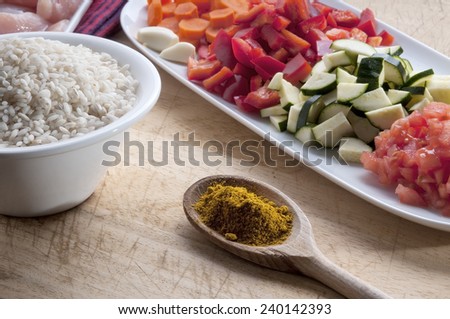 raw ingredients ready to prepare chicken curry with vegetables