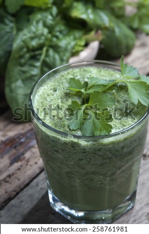 refreshing and detoxifying drink  derived from  plants and vegetables green  leaves selective focus