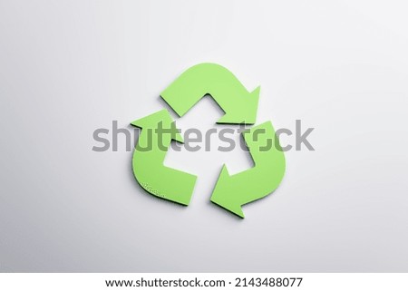 Green recycle sign on white background. Reuse and waste concept. 3D Rendering