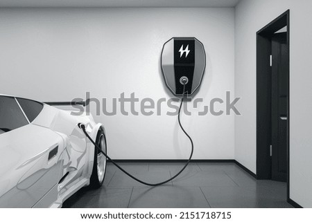 Modern white electric car in a light garage charging with a home electricity power charger on the wall. 3D rendering