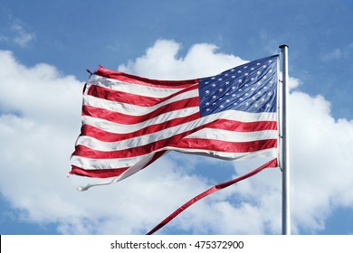 American Flag Flying Against Blue Sky Stock Photo Shutterstock