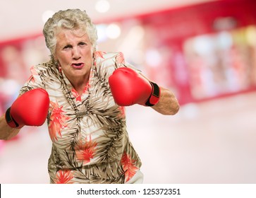 Angry Mature Woman Wearing Boxing Gloves Stock Photo 125372351