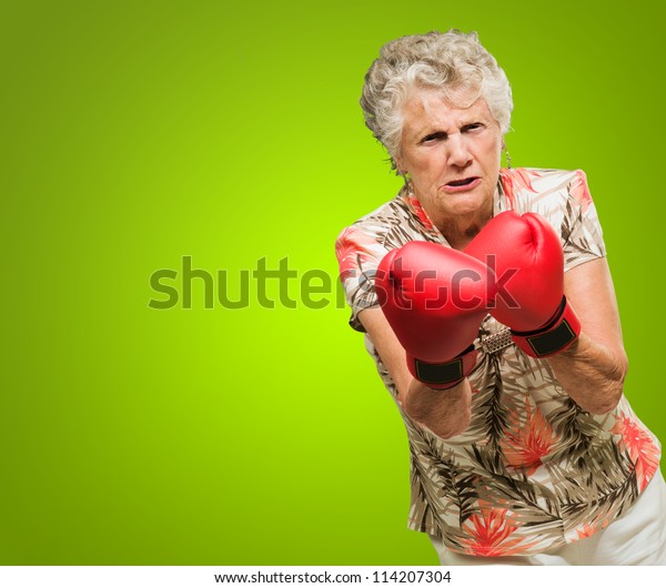 Angry Mature Woman Wearing Boxing Glove Stock Photo 114207304