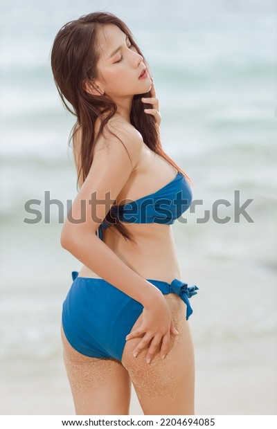 Asian Woman Wearing Blue Bikini Swimming Stock Photo 2204694085