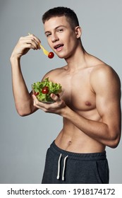 Athletic Guy Muscular Torso Eating Salad Stock Photo