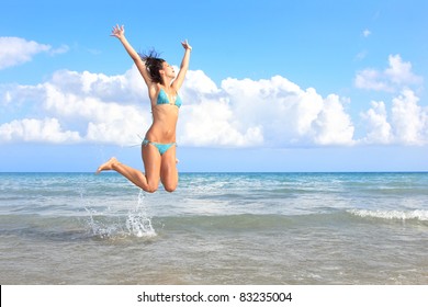 Happy Blonde Leaping On Beach Bikini Stock Photo Shutterstock