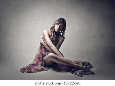 Стоковая фотография 133515590 Attractive Naked Woman Cloth That Covers