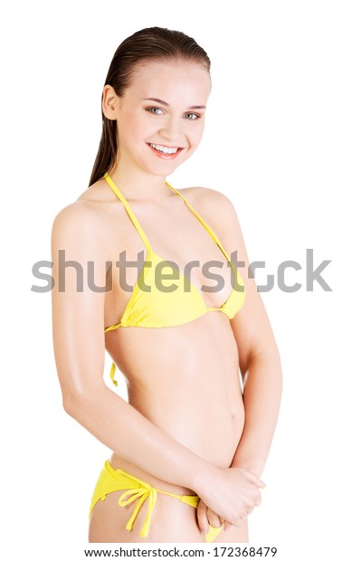 Attractive Wet Woman Yellow Bikini Isolated Stock Photo