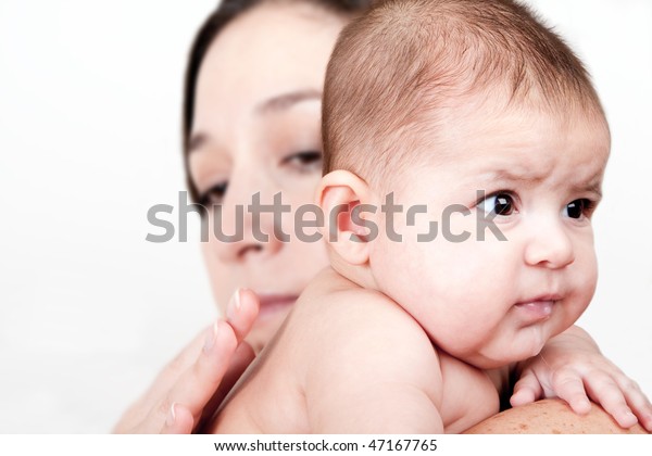 Beautiful Caucasian Hispanic Latina Mother Holding Stock Photo