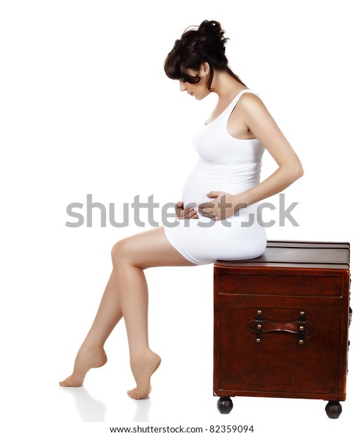 Beautiful Eight Months Pregnant Brunette Woman Stock Photo