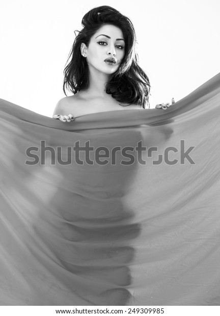 Стоковая фотография 249309985 Beautiful Naked Woman Hiding Behind