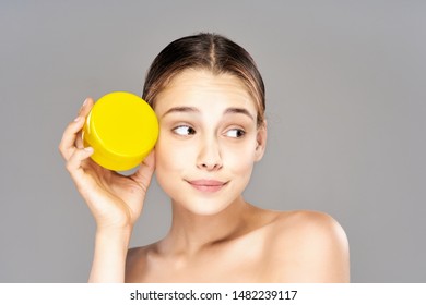 Beautiful Woman Naked Shoulders Cosmetics Lotion Stock Photo