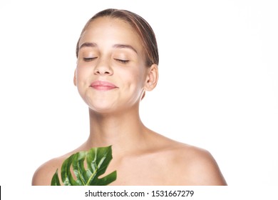 Beautiful Woman Naked Shoulders Palm Leaf Stock Photo