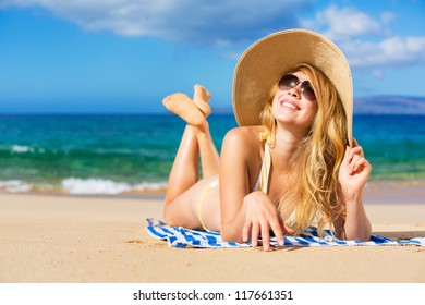 Beautiful Woman Sunbathing On Tropical Beach Foto Stok