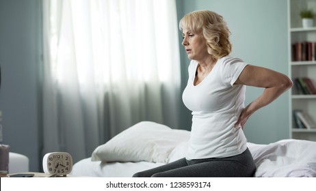 Aged Woman Suffering Low Back Pain Stock Photo 1238598001 Shutterstock