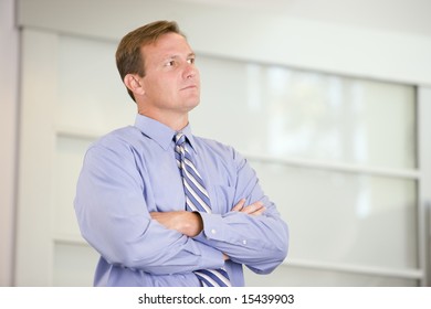 Businessman Standing Indoors Stock Photo Edit Now