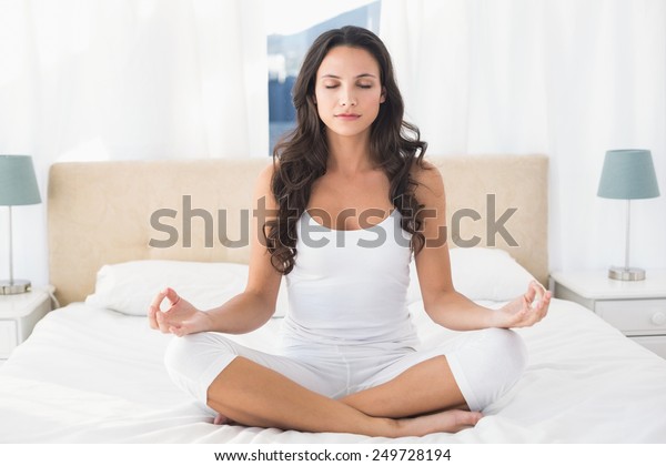 Calm Brunette Doing Yoga On Bed Stock Photo Shutterstock