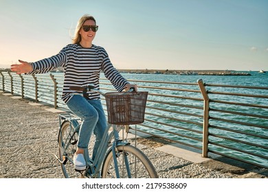 Carefree Woman Bike Riding On Beach Stock Photo Shutterstock