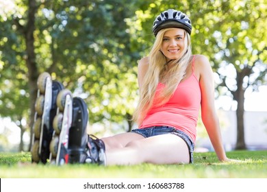 Casual Cheerful Blonde Wearing Inline Skates Stock Photo Edit Now