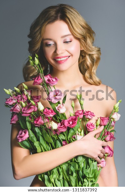 Cheerful Naked Woman Holding Bouquet Flowers Stock Photo