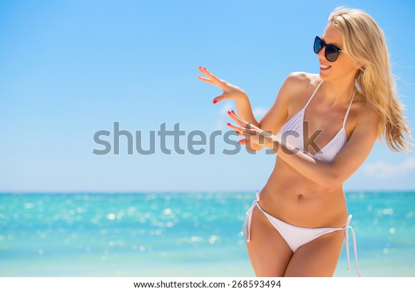 Стоковая фотография 268593494 Cheerful Woman White Bikini On Beach