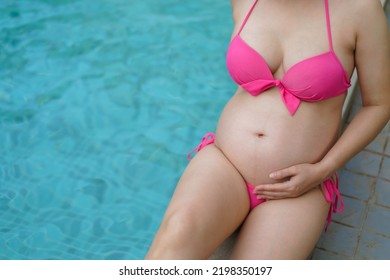 Close Belly Pregnant Woman Bikini Sitting Stock Photo