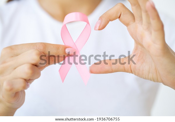 Close Woman Showing Pink Ribbon Symbolizing Stock Photo Edit Now