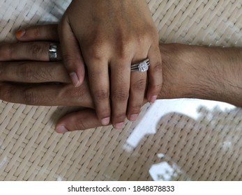 Couple Holding Hands Showing Wedding Rings Stock Photo Edit Now