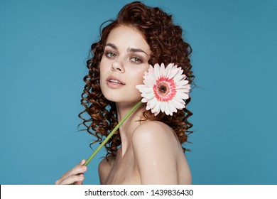 Curly Hair Pink Flower Naked Shoulders Stock Photo