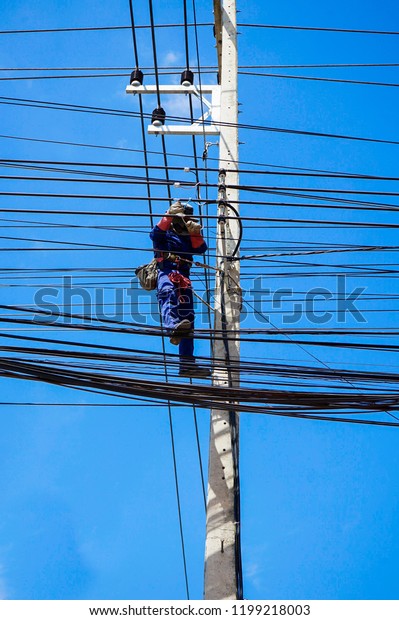 Electrician Working On Electric Pole Stock Photo Shutterstock