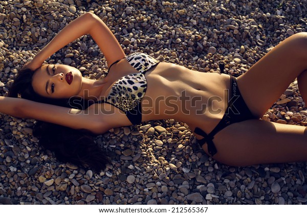 Fashion Photo Of Sexy Girl With Tanned Body In Bikini Posing On Sunset