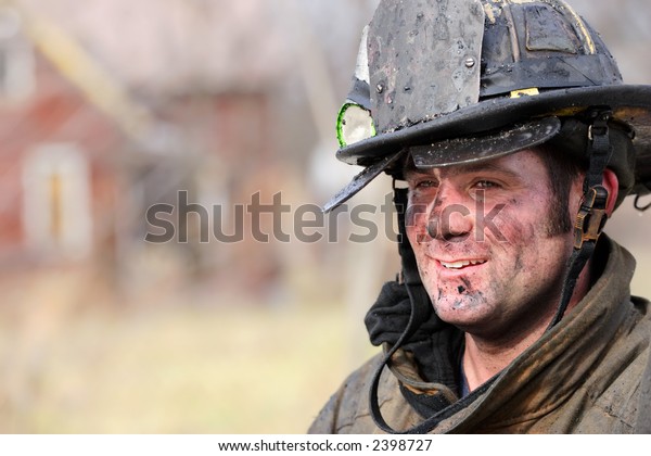 Firefighter Rests After Fighting House Fire Stock Photo Edit Now