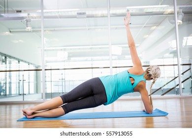 Fit Blonde Doing Exercise On Mat Stock Photo 557913055 Shutterstock