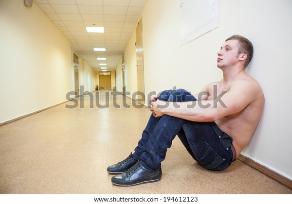 Frustrated Teenage Boy Naked Torso Sitting