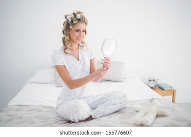 Relaxed Blonde Wearing Hair Curlers Phoning Stock Photo 155522081