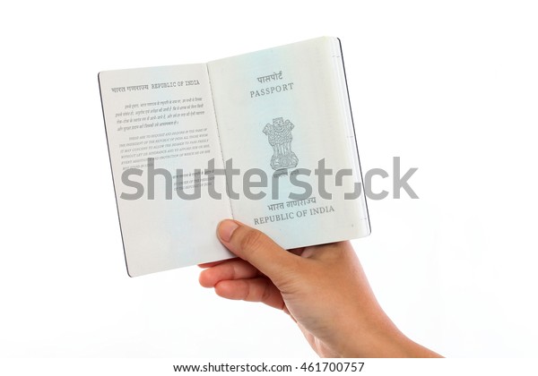 Hand Holding Indian Passport Open Against Stock Photo Edit Now