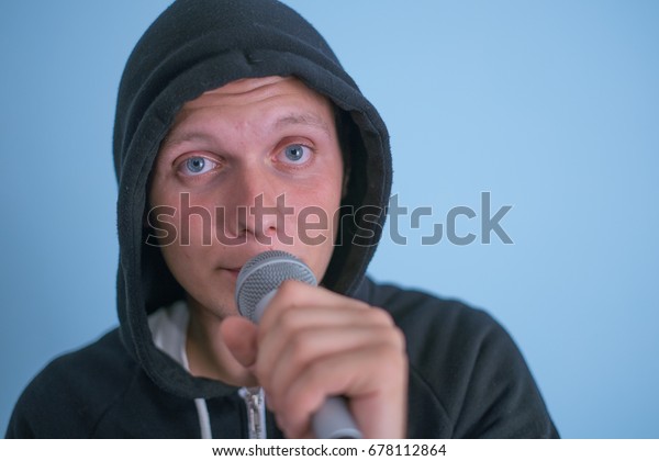 Hand Holding Microphone Conducting Business Interview Stock Photo