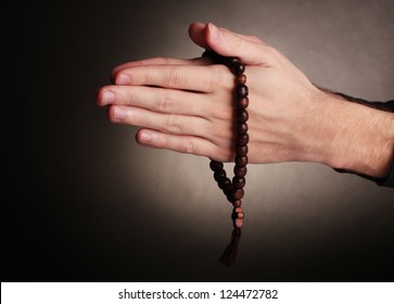 Hands Holding Wooden Rosary On Grey Stock Photo Shutterstock