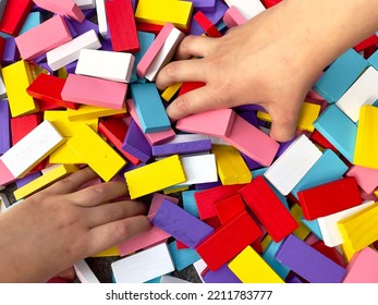 Hands Selecting Colourful Wooden Blocks Stock Photo 2211783777