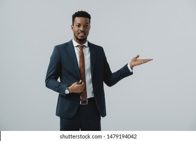 Cheerful African American Man Pointing Fingers Stock Photo Edit Now